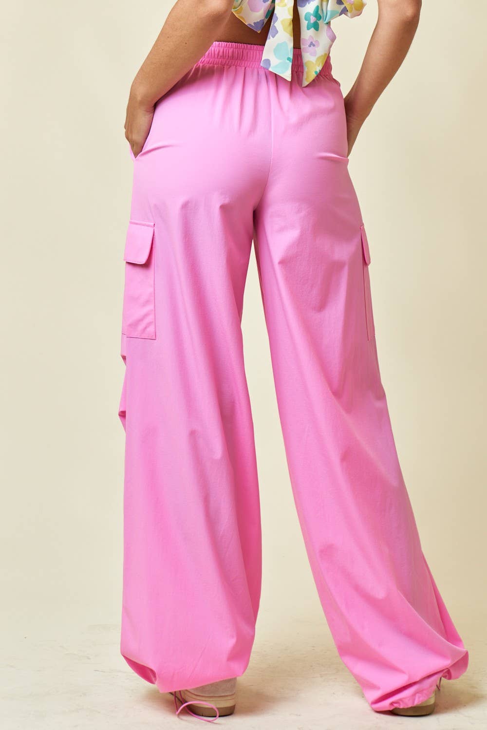 back view of womens hot pink Nylon Jogger Cargo Pants with Side Pockets