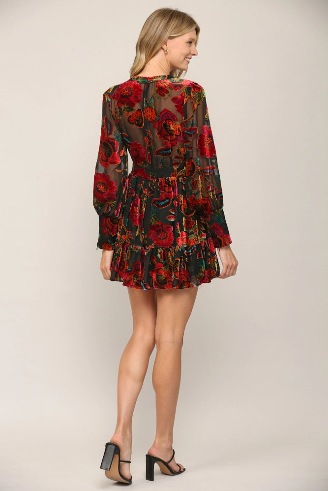 back view of FLORAL BURN OUT VELVET FLARE LONG SLEEVE DRESS showcasing sheer back