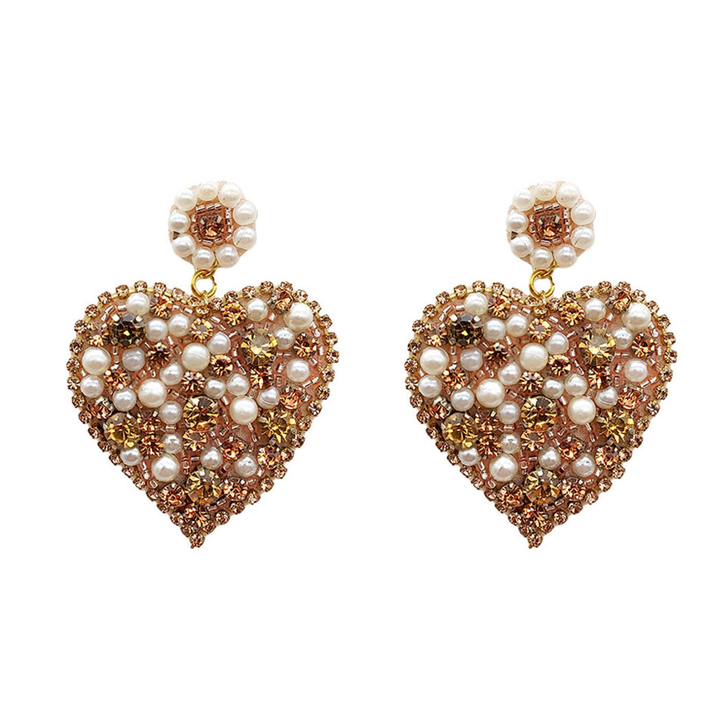 A pair of Beaded Heart Mixed gold Rhinestone and Pearl  Earrings for Valentine's day on a white background