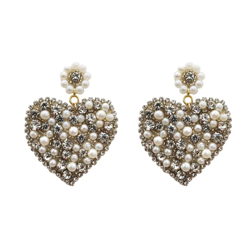 A pair of Beaded Heart Mixed diamond Rhinestone and Pearl Earrings for Valentine's day on a white background